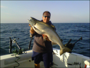 man with large fish